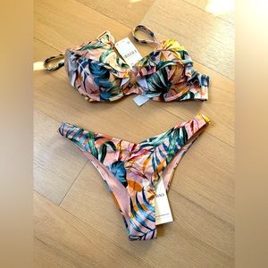 New bikini set from Oysho size M. Pink with pastel prints